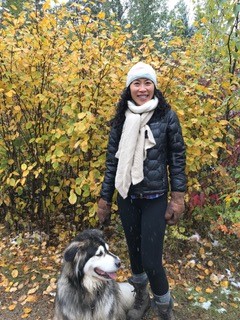 Photo of Dr. Kitty Chan with her dog.